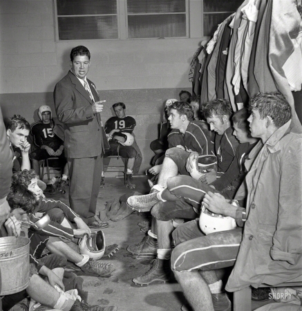 Photo showing: Friday Night Lions -- November 1952. Hamlet (North Carolina) High School football team in locker room at away game.