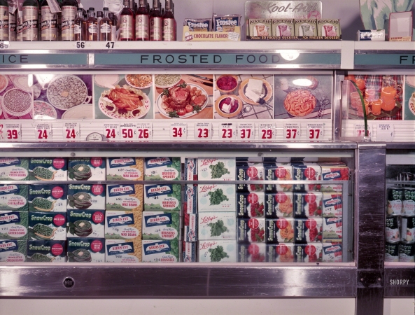 Photo showing: Frosted Foods -- Supermarket frozen food display case circa 1953.