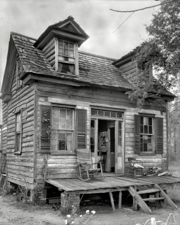 Photo showing: Open House -- Circa 1936. Dormered cabin. Georgetown County, South Carolina.