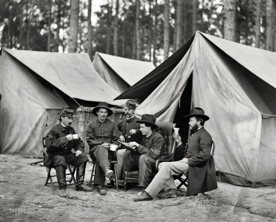 Photo showing: The Cocktail Hour -- October 1864. Petersburg, Virginia. Hospital stewards of 2d Division, 9th Corps, in front of tents.