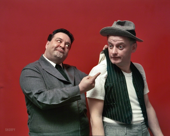 Photo showing: Ralph and Ed -- April 1955. Jackie Gleason and Art Carney posed as 'Honeymooners' characters Ralph Kramden and Ed Norton. 