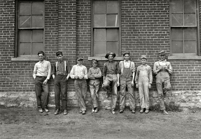 Photo showing: Muncie Wheel and Jobbing -- October 1908. Muncie, Indiana. Noon hour. Muncie Wheel & Jobbing Co. Most of the boys were gone home to dinner. 