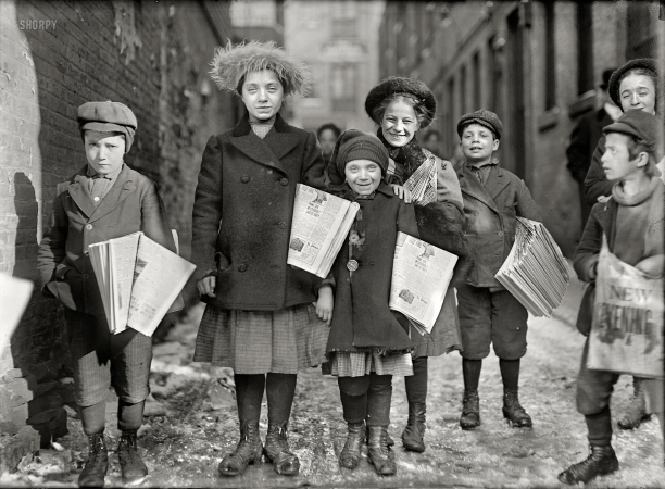 Photo showing: News for Girls -- March 1909. Hartford, Conn. Newsgirls coming through the alley. The smallest girl has been selling for 2 years.