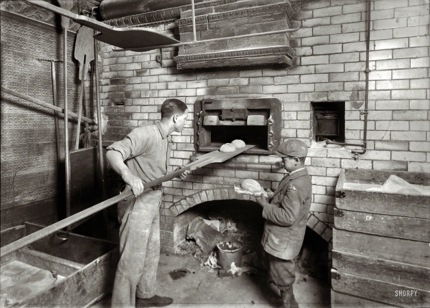 Photo showing: Baker Brothers -- Feb. 1, 1917. Cambridge, Mass. Vincenzo Messina, 15 years old and brother Angelo, 11, baking bread for father, 174 Salem St.