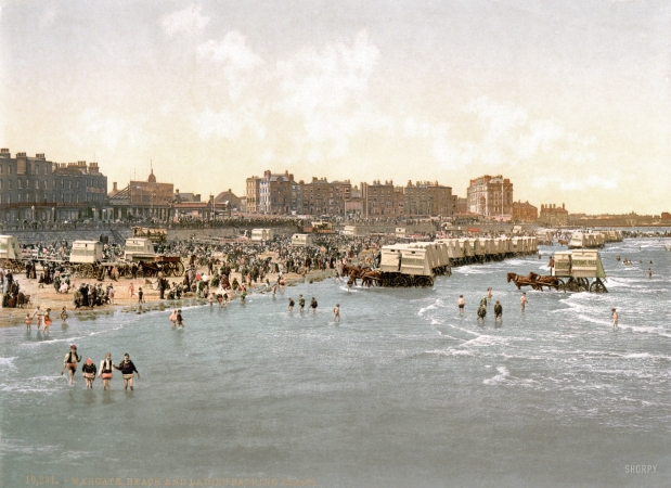 Photo showing: Ladies Bathing Place -- Circa 1890s-1900. Beach and ladies' bathing place with bathing machines, Margate, England.
