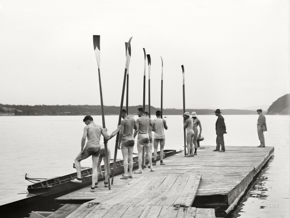 Photo showing: Wet Behind the Oars -- June 18, 1911. Cornell varsity crew squad at Poughkeepsie.