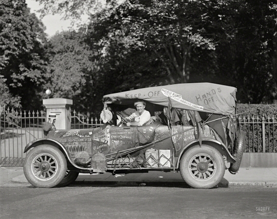 Photo showing: Traveling De Lux -- Washington, D.C. Jeff Davis, 8/30/24. The Hobo King in his limousine, a circa 1917 REO touring car.