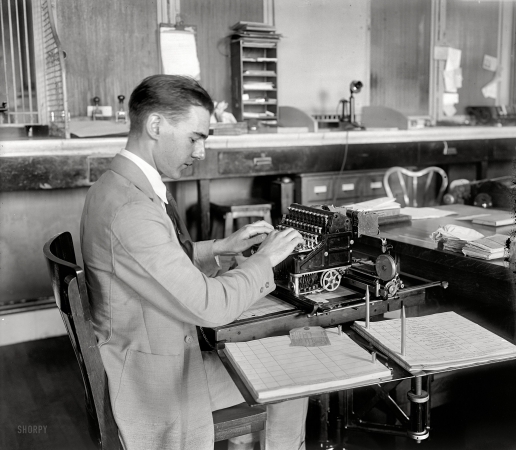 Photo showing: Money Machine -- Washington, D.C., circa 1920. Post Office money order machine.