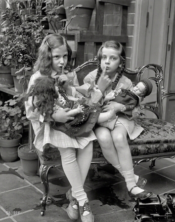 Photo showing: Our Little Secret -- Washington, D.C., circa 1924. Two young girls with dolls.