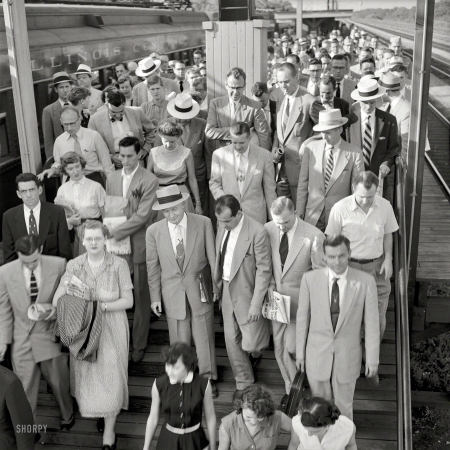 Photo showing: Park Forest -- July 1954. Commuters on platform after getting off train. Park Forest, Illinois.