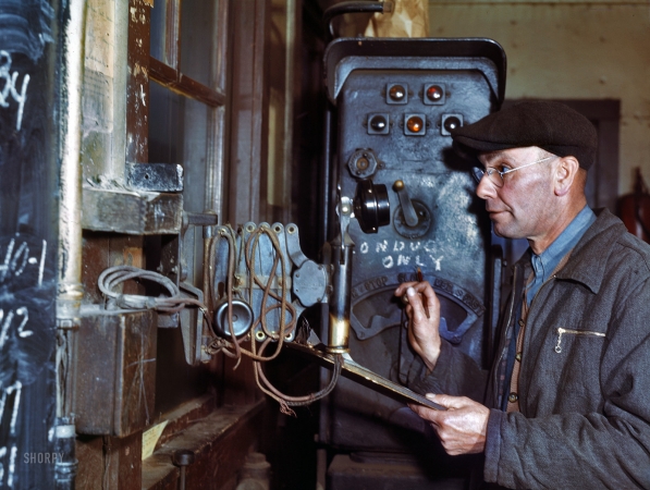 Photo showing: Hump Master -- December 1942. Hump master in Chicago & North Western railroad yard.
