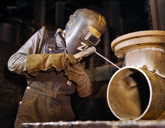 Photo showing: Pipe Dream -- June 1942. Combustion Engineering Co., Chattanooga, Tennessee. Welder making boilers for a ship.