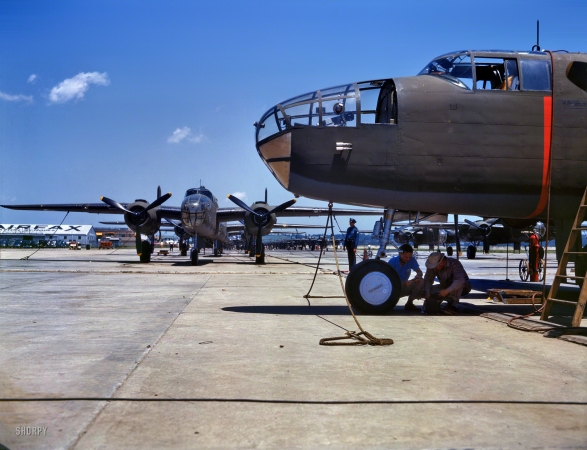 Photo showing: Hatchlings -- October 1942. New B-25 bombers lined up for final inspection and tests at the North American Aviation plant in Kansas City. 