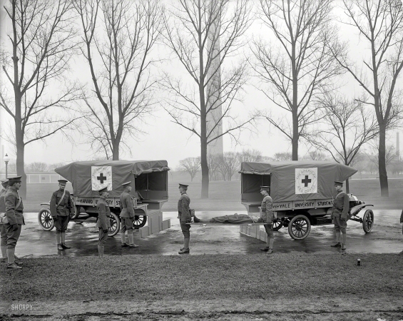 Photo showing: Ivy League Ambulance -- Circa 1919. Red Cross ambulances at Washington Monument.