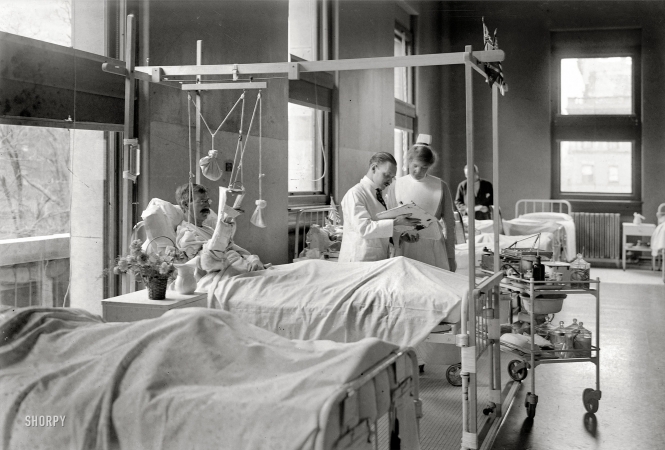 Photo showing: In Traction -- New York, May 1917. St. Luke's Hospital men's ward.