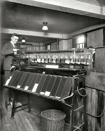 Photo showing: Fourteenth Census -- December 1919. Washington, D.C. Sorting machine, U.S. Census.