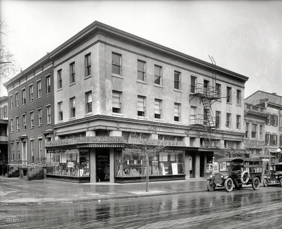 Photo showing: Shady Business -- Washington, D.C., circa 1920. Hooper & Klesner Building, 12th & H Streets.