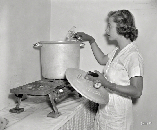 Photo showing: Kook-Kwick -- August 18, 1937. Washington, D.C. Baby Service, Inc. Miss Ann Turner sterilizing bottles.