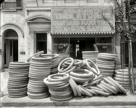 Photo showing: Tires Half Off -- Washington, D.C., circa 1920. Amalgamated Tire stores, front.
