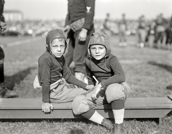 Photo showing: Junior Varsity -- October 1922. Football. Two little leatherheads at the Navy-Georgia Tech game in Annapolis.