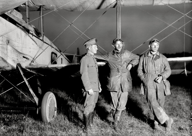 Photo showing: Wingmen -- October 1919. Transcontinental air race, Roosevelt Field, New York. Col. A. Miller, Lt. E.C. Kiel, Sgt. F.K. McKee.