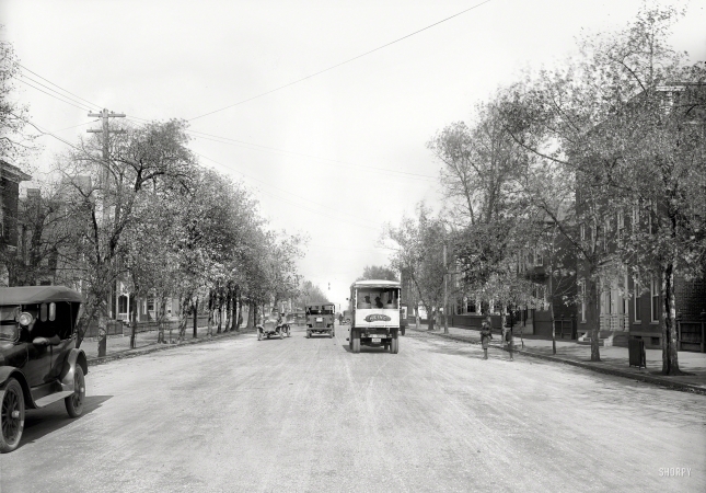 Photo showing: Truck Traffic -- 1920. Barrett Paving Co., Alexandria, Virginia.