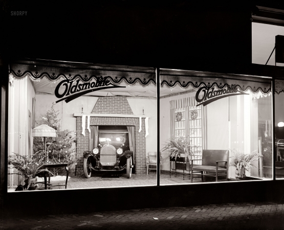 Photo showing: One Hot Car -- Washington, D.C., circa 1922. Oldsmobile sales window.