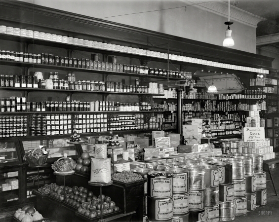 Photo showing: Burchell Grocery -- Washington, D.C., circa 1921. Interior, Burchell's. The N.W. Burchell grocery at 1325 F Street N.W.
