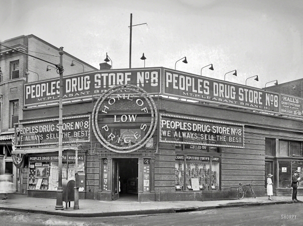 Photo showing: Cigars Candy Kodaks -- Washington, D.C., circa 1922. People's Drug Store No. 8, 14th Street & Park Road.