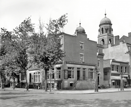 Photo showing: Ninth and H -- Washington, D.C., circa 1920. 9th & H Streets N.W. Home to the National Photo Company.