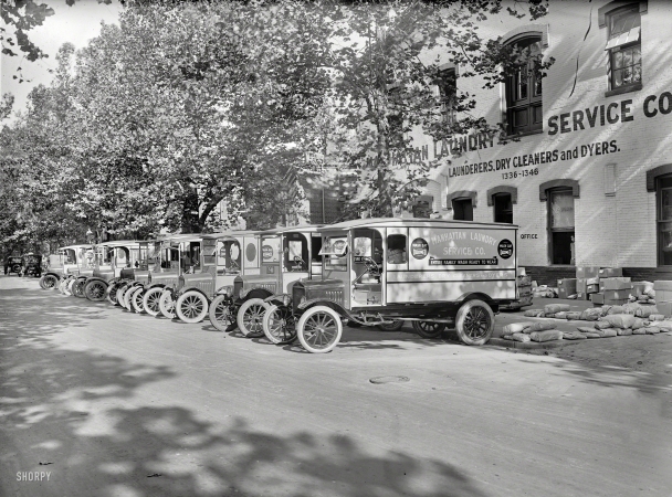 Photo showing: WASH DAY DOOMED -- Washington, D.C., 1924. Ford Motor Co. -- Manhattan Laundry trucks.