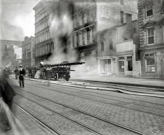 Photo showing: Fire on F Street -- May 18, 1913. Washington, D.C. U.S. Geological Survey fire, F Street N.W.