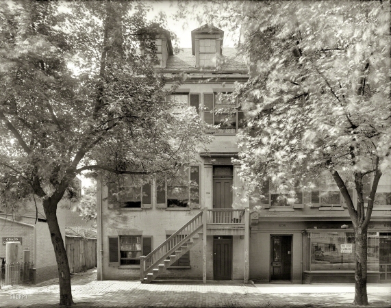 Photo showing: Assassins Lair -- Washington, D.C., circa 1925. House at 604 H Street N.W., at which plot to assassinate Lincoln was hatched.