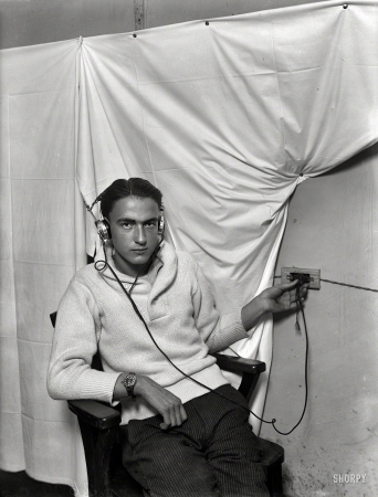 Photo showing: Linked In -- Washington, D.C., 1924. By merely plugging the head telephone in the wall,
each bedridden soldier in Walter Reed Hospital is provided with radio entertainment.