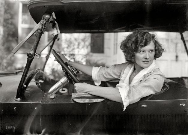 Photo showing: Marilyn -- New York circa 1921. Stage actress Marilyn Miller in the driver's seat.