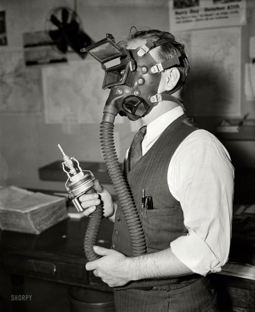 Photo showing: Hi-Tech Headgear -- Oct. 15, 1936. Washington, D.C. Protection against that dreaded disease Silicosis is assured
underground workers with this new sand-blasting helmet developed by William P. Biggs.