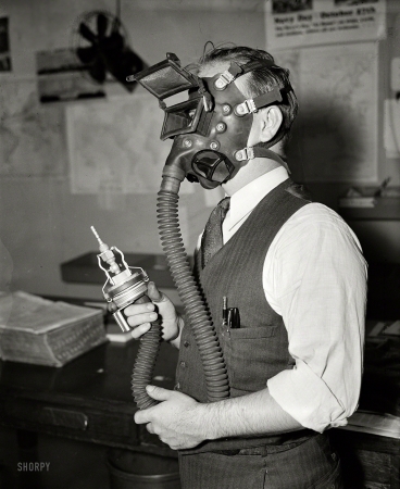 Photo showing: Hi-Tech Headgear -- Oct. 15, 1936. Washington, D.C. Protection against that dreaded disease Silicosis is assured
underground workers with this new sand-blasting helmet developed by William P. Biggs.