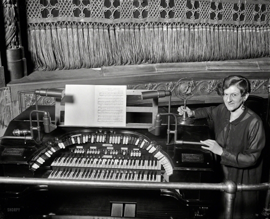 Photo showing: Madam's Organ -- Washington. D.C., 1928. Miss Irene Juno, Keith's Theatre organist.