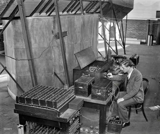 Photo showing: Bright Star -- Washington, D.C., circa 1929. Man operating radio set.