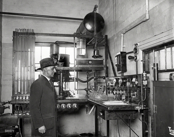 Photo showing: Levers of Power -- Dec. 30, 1929. Dr. K.C. Dickinson, chief of the Heat and Power Division of the Bureau of Standards,
and the control room of the new aircraft engine testing laboratory at Arlington, Virginia.