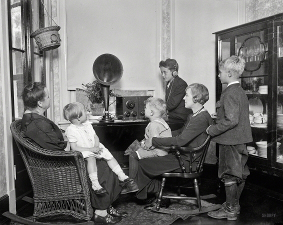 Photo showing: Home Entertainment -- Washington, D.C., circa 1925. Family group listening to radio.