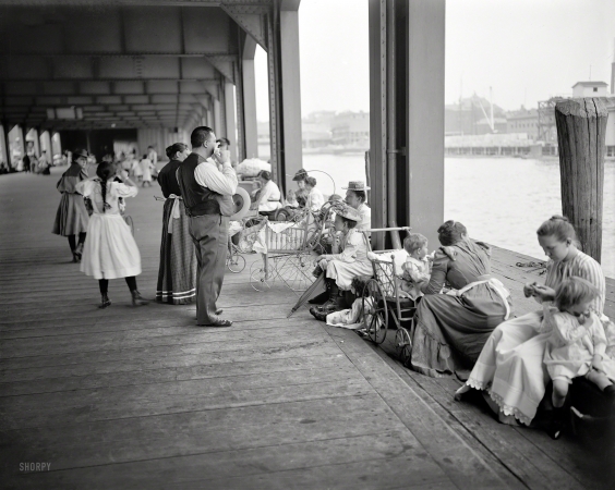 Photo showing: Baby Buggy Parade -- Circa 1900. Recreation dock (amusement pier), New York.