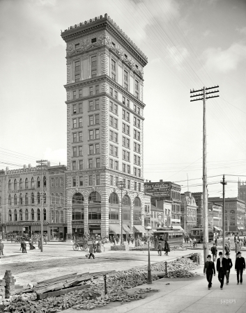 Photo showing: Men in Black -- Dayton, Ohio, circa 1904. Conover Building, Third and Main.