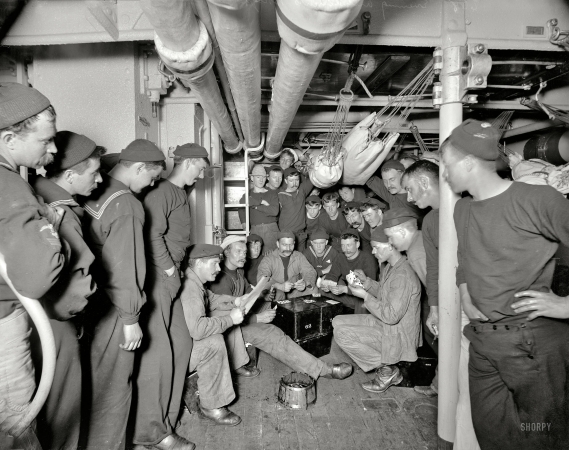Photo showing: Playing With a Full Deck -- Evening amusements. A little game, aboard the U.S.S. Brooklyn, circa 1897.