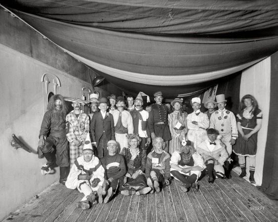 Photo showing: Maine Stage -- Aboard the U.S.S. Maine in 1896. A fancy dress ball.