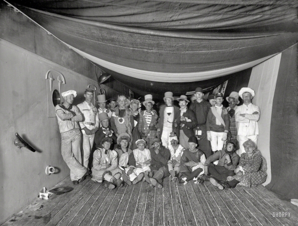 Photo showing: Cast and Crew -- Aboard the U.S.S. Maine in 1896. A fancy dress ball.
