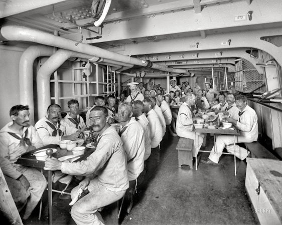 Photo showing: Maritime Mess Call -- Circa 1900. U.S.S. Massachusetts crew at mess.