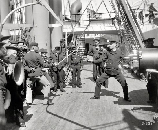 Photo showing: Navy Fencers -- Circa 1900. U.S.S. Newark -- sword exercise.