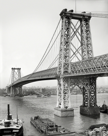 Photo showing: Busy River -- New York circa 1904. Williamsburg Bridge from Brooklyn. The new span over the East River.