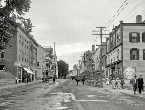 Photo showing: Gasolene Sold Here -- Circa 1908. Littleton, New Hampshire -- Main Street. Note the sign advertising AUTOMOBILE GASOLENE.
